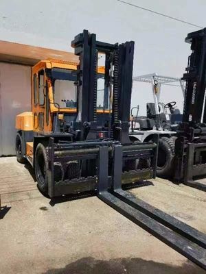 Camión elevador de 10 toneladas TCM FD100 usado con motor diésel y en buen estado