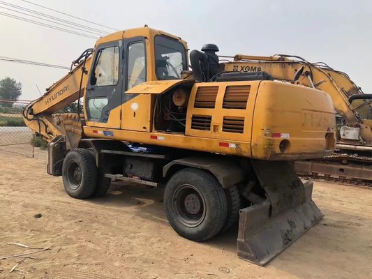 Excavadora de ruedas Hyundai 210W en excelente estado con motor original