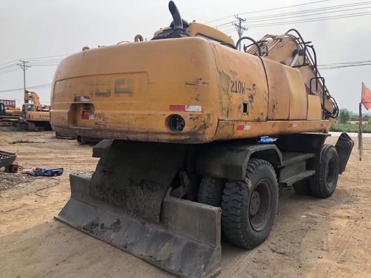 Excavadora de ruedas Hyundai 210W en excelente estado con motor original