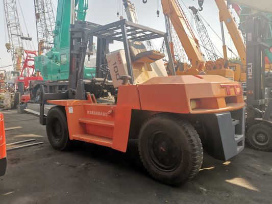 Camión elevador de 10 toneladas FD100 TCM en buenas condiciones con motor diesel y anchura de tenedor de rutina