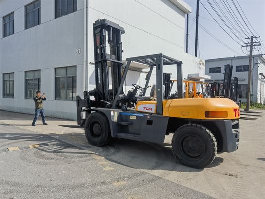Elevadora elevadora diésel de 10 toneladas TCM japonesa Elevadora elevadora usada FD100 con ancho de horquilla Descuento de rutina