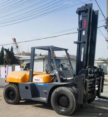 Elevadora elevadora diésel de 10 toneladas TCM japonesa Elevadora elevadora usada FD100 con ancho de horquilla Descuento de rutina