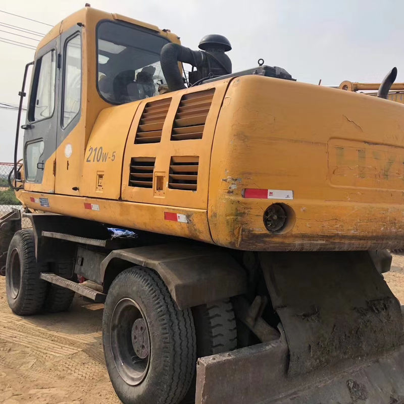Excavadora de ruedas Hyundai 210W en excelente estado con motor original
