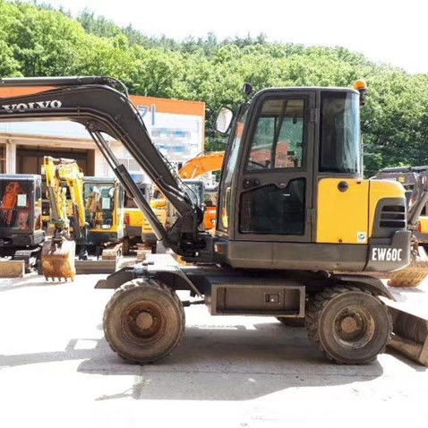 Volvo EW60 Mini Excavadora de ruedas de 2 toneladas con otra capacidad de cubo en buen estado